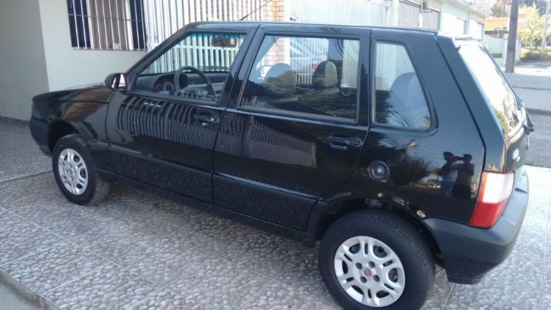 Fiat Uno Mille Fire Flex Economy 4 Portas Completo